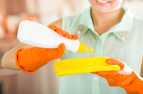 Experienced Marylebone cleaner polishing a stylish interior
